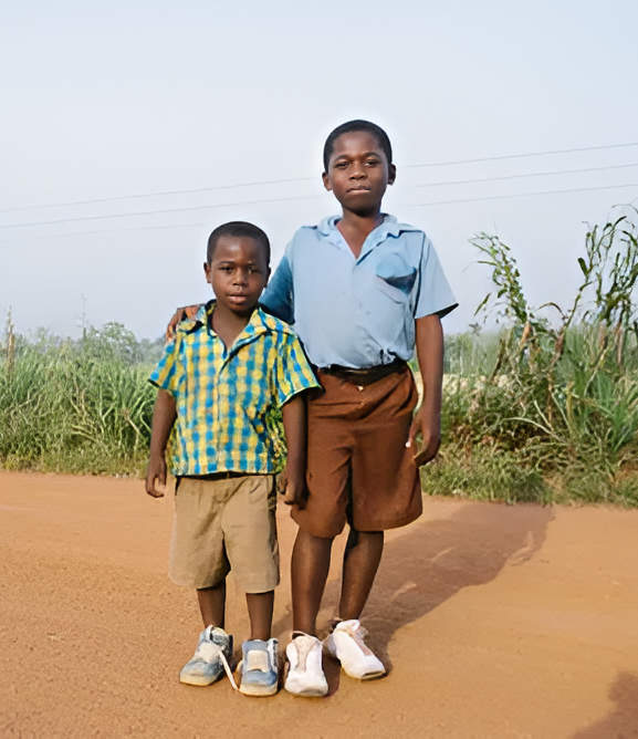 Two boys standing on road. | Siuolroffa